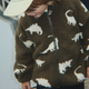 Konges Slojd dětská fleecová bunda Joddy Teddy GRS Dino Silhouette